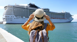 Woman looking at a cruise ship